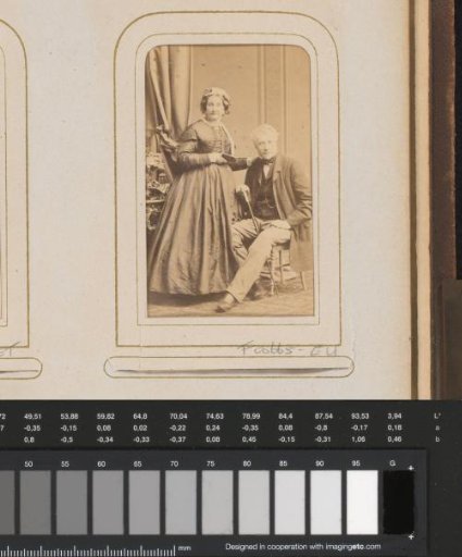 Portrait of A. Menalda with staff and his wife with a workbasket