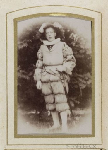 Portrait of a young man in costume with a sword