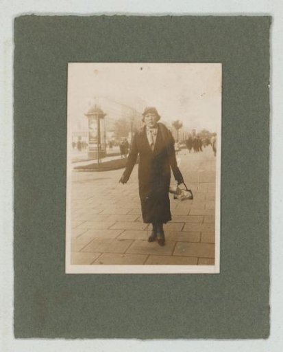 Portrait of a woman on the street with parcels
