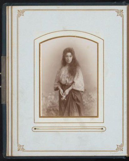 Portrait of a standing actress in medieval theatrical costume
