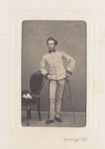 Portrait of a standing man with a sabre