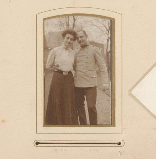 Portrait of a Woman and a Man in Military Uniform