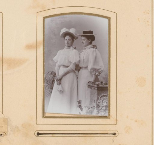 Portrait of two young women with hats
