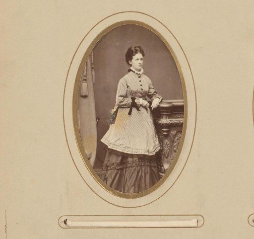 Portrait of a woman leaning on a balustrade