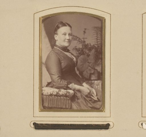Portrait of a Seated Woman Holding a Book