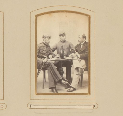 Portrait of Three Men at a Table