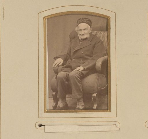 Portrait of an old man in a chair, identified as C. H. Tölle