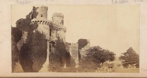 Ruin of Herstmonceux Castle in East Sussex with Two Carriages in Front