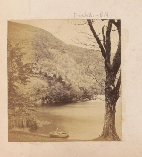 Landschap met een water en een roeiboot in Engeland