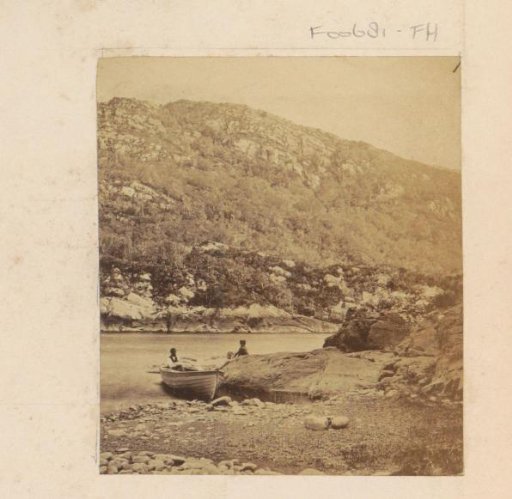 Rivierlandschap in Engeland met twee mannen bij een roeiboot