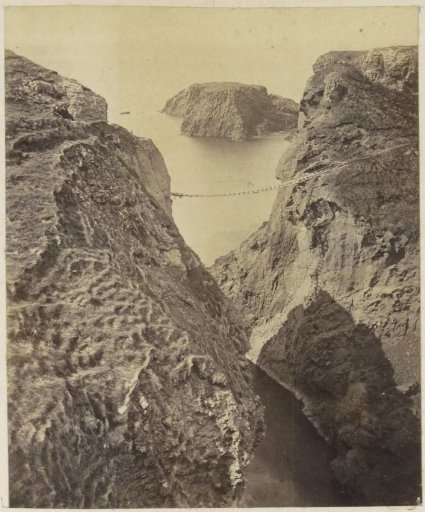 Rock Formations on the English Coast with a Footbridge