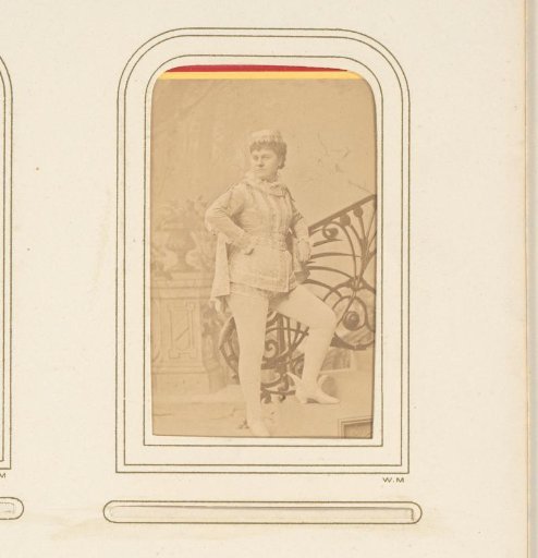 Portrait of an actress in costume on a staircase