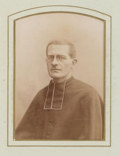 Portrait of a Man with Glasses