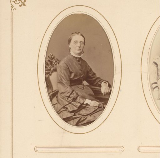 Portrait of a Woman Sitting at a Table