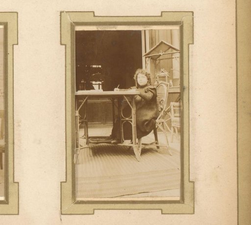 Portrait of a Seated Girl at a Table