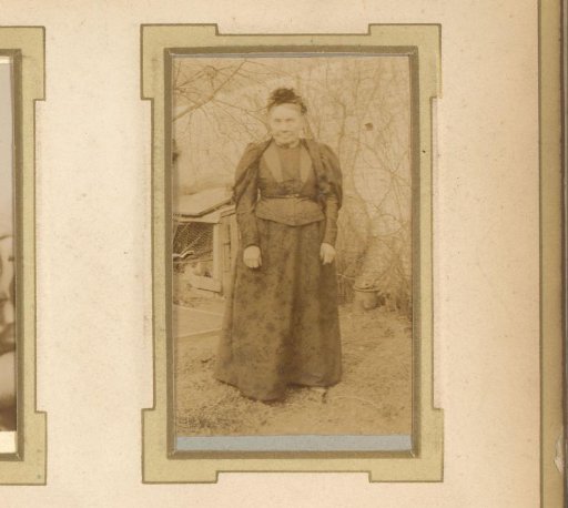 Portrait of a Standing Woman in a Garden