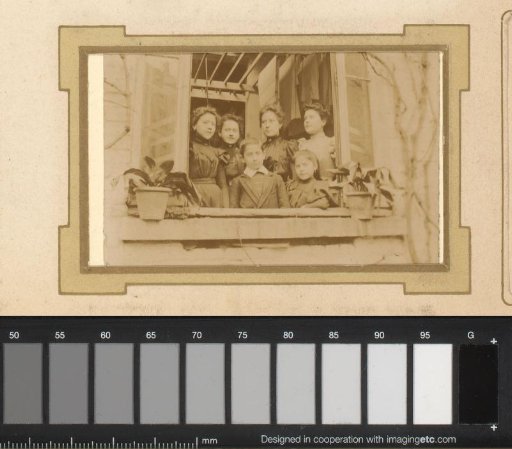 Group Portrait of Five Women and a Boy at a Window