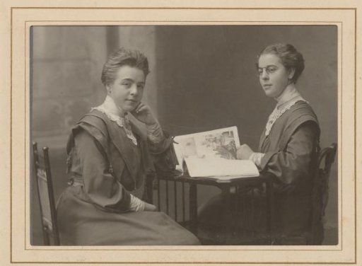 Portrait of two women at a table, identified as Betsy and Gertrud Kopp