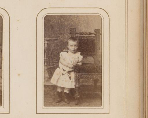 Portrait of a Toddler Leaning on a Chair, Labeled as Max Hecht