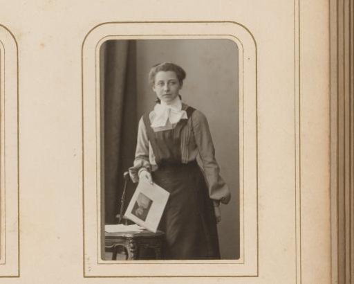 Portrait of a Young Woman with a Leaf in Her Hand