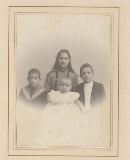 Group Portrait of a Girl, Two Boys, and a Baby