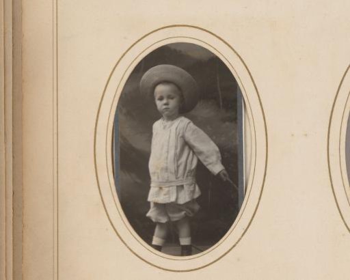 Portrait of a toddler with a hat