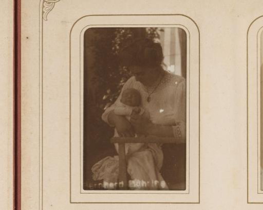 Portrait of a woman with a baby on her lap