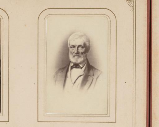 Photographic reproduction of a drawn portrait of a bearded man
