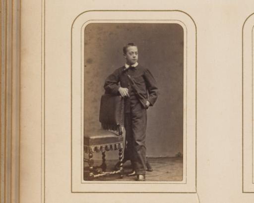Portrait of a Boy Leaning on a Chair