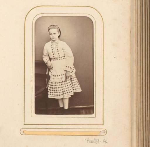 Portrait of a Standing Girl by a Chair