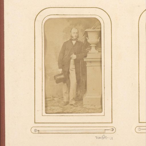 Portrait of a standing man with a top hat