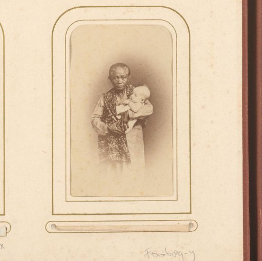 Portrait of a standing governess with baby in arms