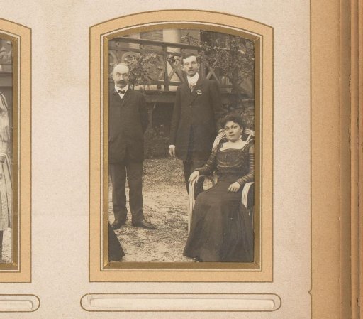 Portrait of two men and a woman