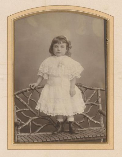 Portrait of a Girl on a Wooden Bench