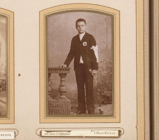 Portrait of a Boy with a White Ribbon on His Arm
