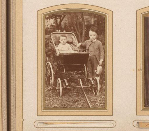 Portrait of a Boy with a Child in a Carriage