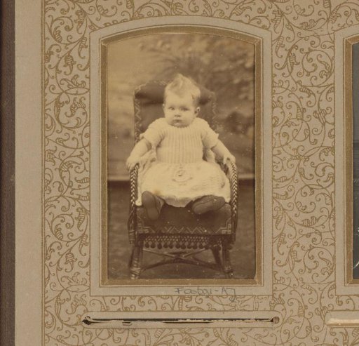 Portrait of a baby in a chair