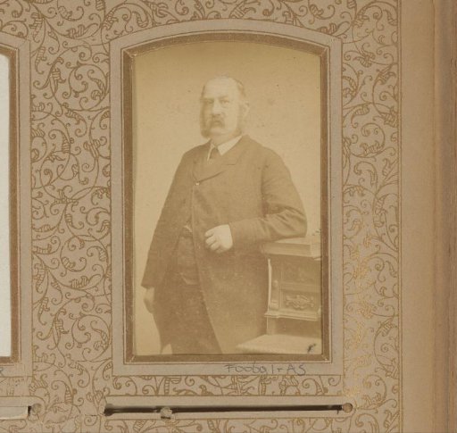 Portrait of a man at a desk