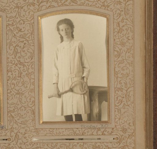 Portrait of a girl with a tennis racket