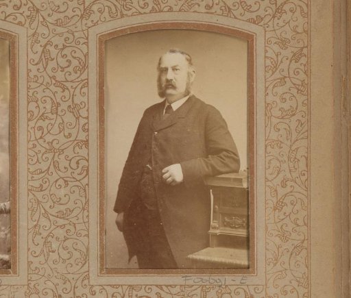 Portrait of a man at a desk