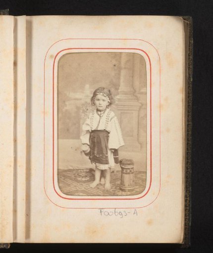 Portrait of a young child in Romanian traditional dress