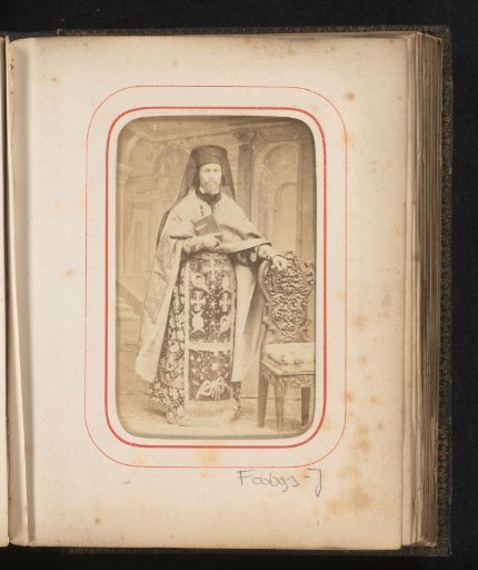 Portrait of a Romanian-Orthodox priest with a Bible