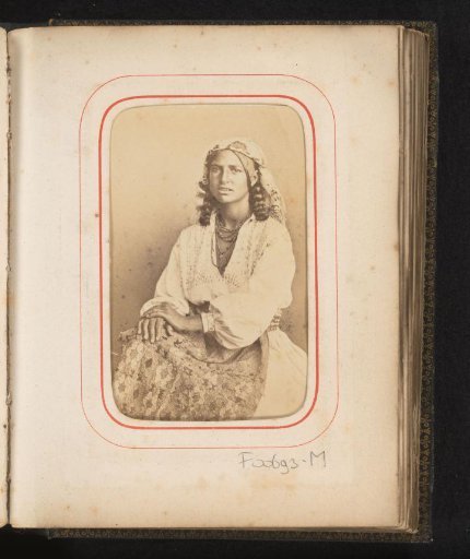 Portrait of a seated woman in Romanian costume