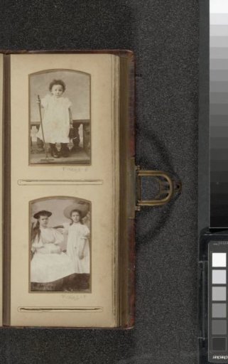 Portrait of two girls in long dresses with hats