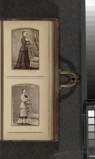 Portrait of a woman standing by an armchair