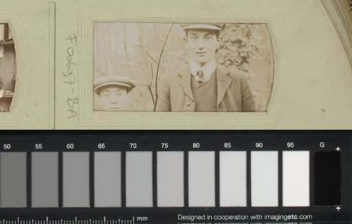 Portrait of two young men with caps