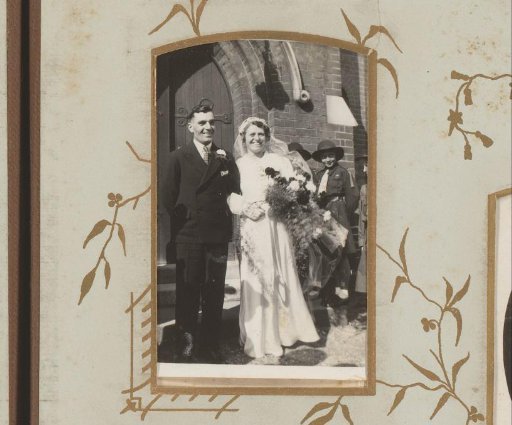 Portrait of a Bride and Groom Before a Church