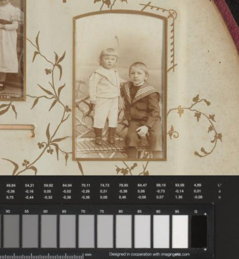 Portrait of two children in sailor suits