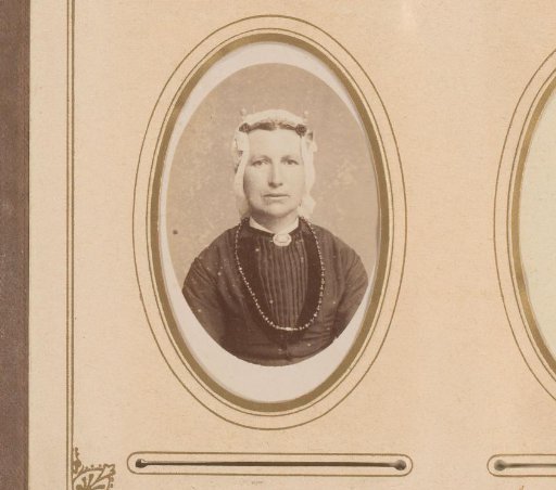 Portrait of a Woman with a Traditional Cap and Ear Ornaments