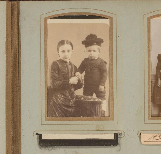 Portrait of a Girl and a Boy, the Boy Standing on a Chair